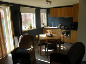 Appartement met zonnige tuin